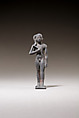 Child god standing and holding a flail, Bronze or cupreous alloy