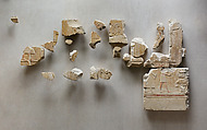 Relief scene from the tomb of Queen Neferu: fragments from two registers showing male and female attendants moving to the right, Limestone, paint