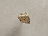 Relief from the tomb of Queen Neferu: the feet of an attendant, Limestone, paint