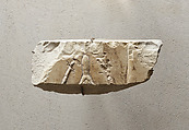 Relief showing the handle of a mirror - see 26.3.353-3, Limestone, paint