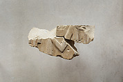 Relief of an attendant raising a necklace in front of a pole-like image
, Limestone, paint