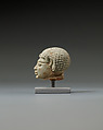Head from a statuette, perhaps of  a dwarf, Faience