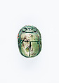 Scarab Depicting Seti II In His Chariot Shooting a Bow and Arrow., Glazed steatite