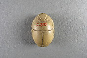 Scarab, Faience, yellow with traces of green glaze