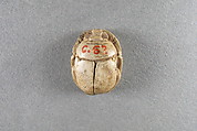 Scarab inscribed with the name of Unis, Faience