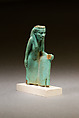 Statuette of a worn or aged woman, probably a goddess, Faience