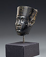 Head from a small statuette, possibly of Min, Steatite