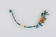 String of Beads and Amulets, Faience, shell, wood
