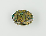 Scarab with device of baboon and falcon on base, Green glazed steatite