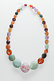 String of beads, Carnelian, garnet, green feldspar, amethyst, green jasper, black and white mottled stone
