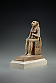 Bastet on a throne decorated with the decans, Faience