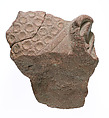 Crown with disks and right ear, Red quartzite