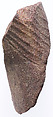 Section of the left leg from a small striding statue, Red quartzite