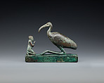 Group statue of Thoth-ibis and devotee on a base inscribed for Padihorsiese, Cupreous metal