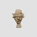 Amulet in the form of a face, Ivory or bone