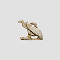 Vulture amulet, Ivory or bone