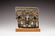 Pectoral with bovine head crowned with disk, horns and feathers, Cupreous metal, carnelian