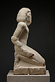 Kneeling captive, Limestone, paint