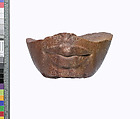 Lower part of a royal head, Red quartzite