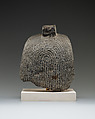 Falcon head with divine wig from a statue with an anthropomorphic body, Diorite