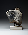 Falcon head with divine wig from a statue with an anthropomorphic body, Diorite