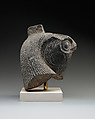 Falcon head with divine wig from a statue with an anthropomorphic body, Diorite