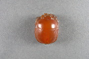 Scarab Inscribed with Horus Supporting the Sun Disk, Carnelian, copper