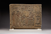 Stela of Siamun and Taruy worshipping Anubis, Sandstone, paint