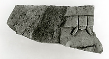 Raised relief fragment with hieroglyphs, Limestone