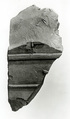 Raised relief fragment with remains of hieroglyphs, Limestone, varnish
