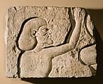 Relief fragment of an Asiatic raising his hands in adoration, Limestone