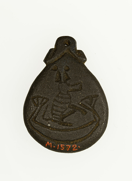 Amulet illustrating a baboon in a boat