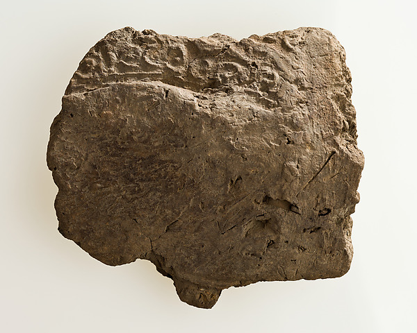 Mud jar sealing impressed with a row of spiral signs