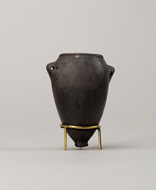 Black polish ware jar with lugs