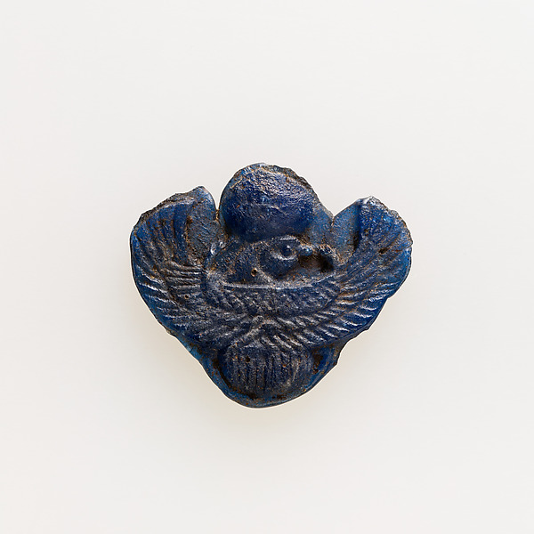 Amulet of winged scarab with falcon head