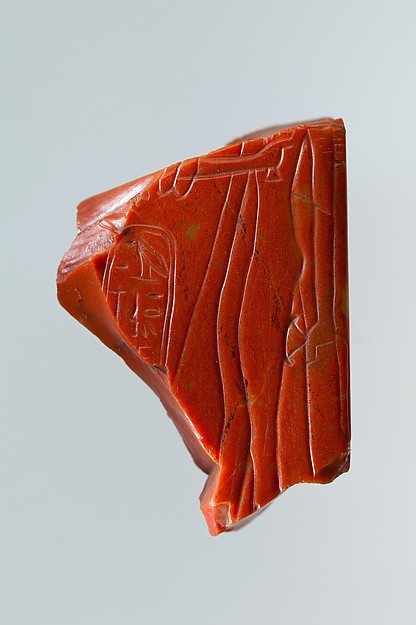 Statue fragment from a standing figure whose back pillar has cartouche of Ramesses II, and the figure of queen Nefertari incised on side by an unrecorded maker, The Metropolitan Museum of Art