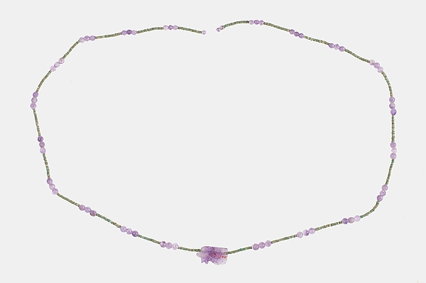String of 63 ball beads and 1 wedjat amulet of Hepy by an unrecorded maker, The Metropolitan Museum of Art