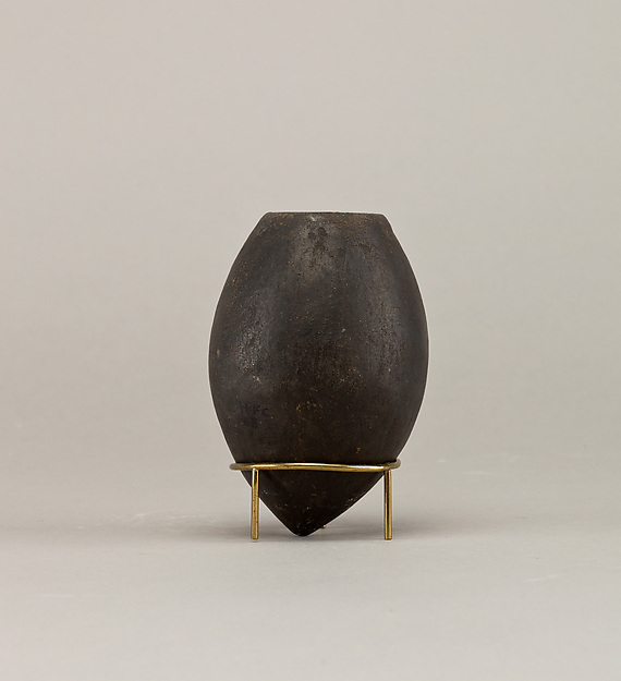 Black ware jar with pointed base