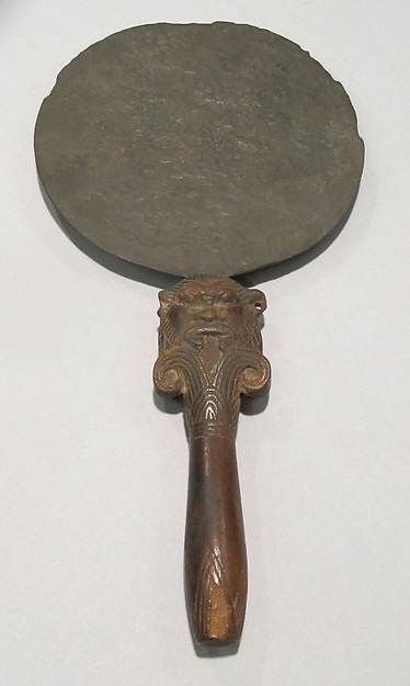 Mirror with a Lotus Handle Decorated with the Head of Bes by an unrecorded maker, The Metropolitan Museum of Art