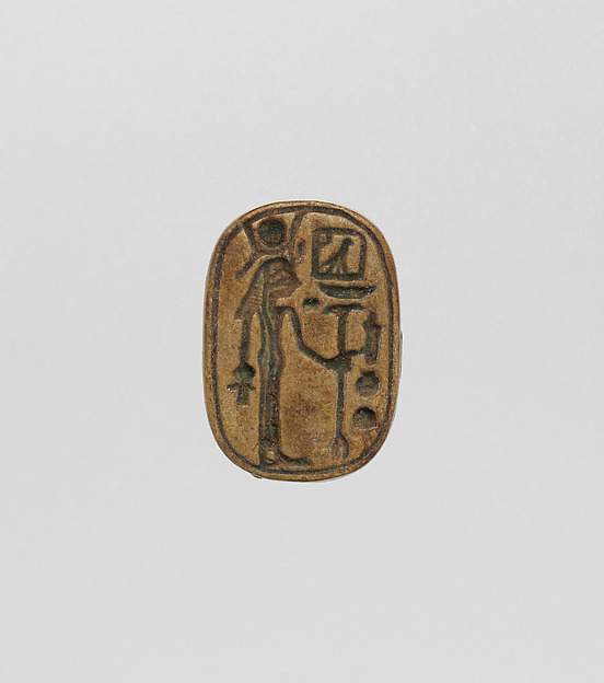 Plaque with Hathor, Mistress of Iwnw on one side, text on opposite side
