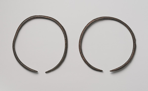 A pair of bracelets or anklets