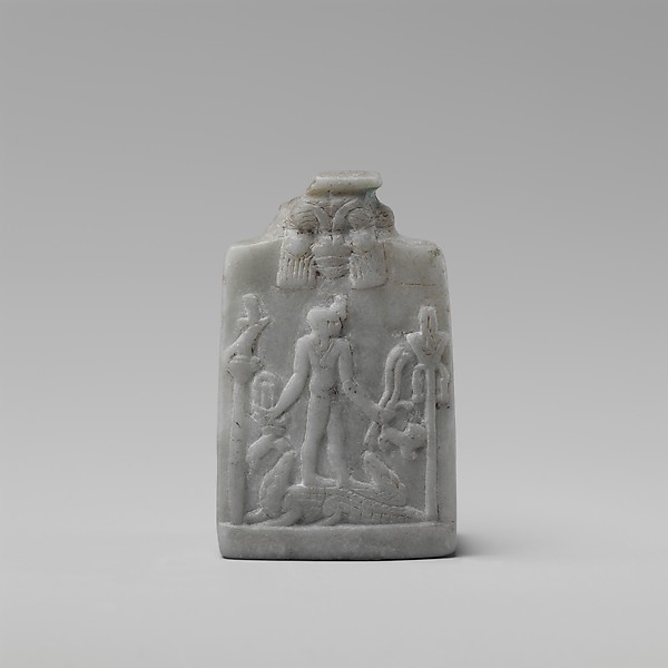 Miniature Cippus (magical stela) with Horus in profile wearing gazelle head on the forehead