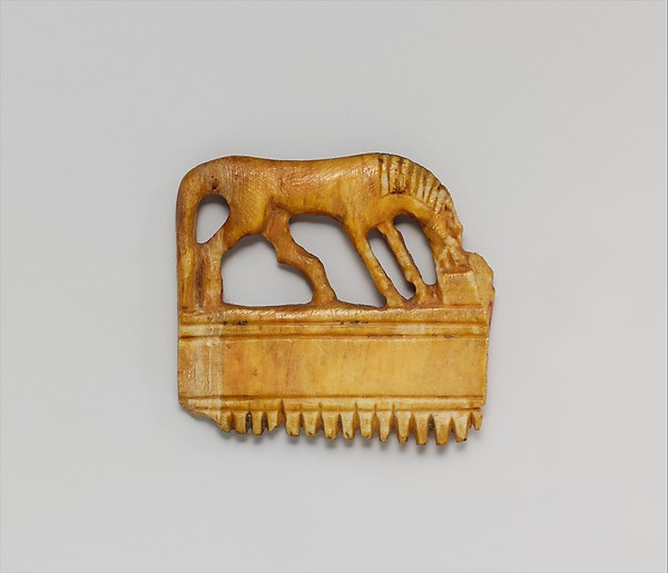 Comb with a horse