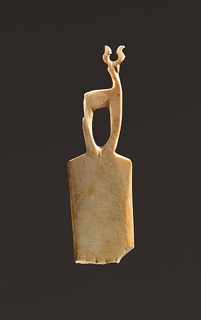 Bone comb with an antelope