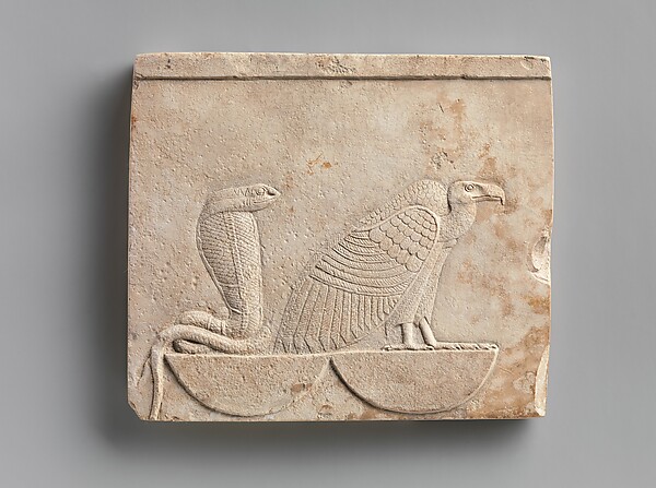 Relief  plaque with Wadjet and Nekhbet, the "Two Ladies"; falcon on opposite