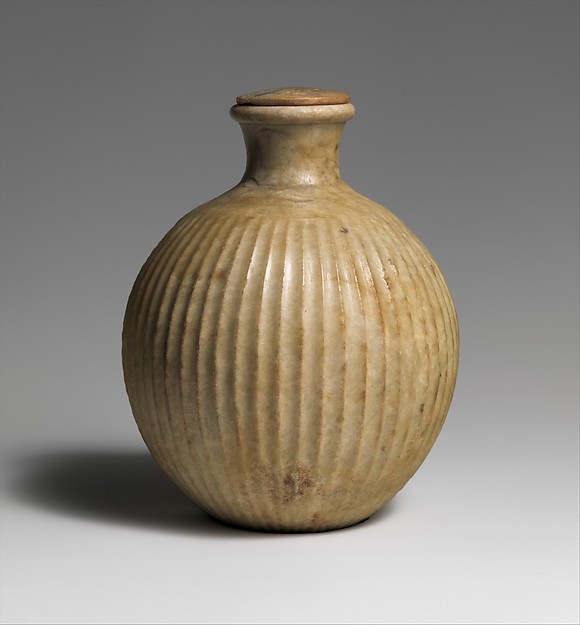 Fluted bottle with lid