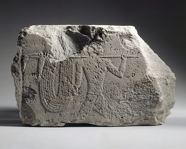 Relief fragment with soldiers running with a rope