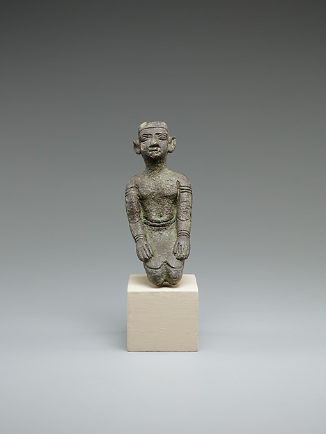 Kneeling priest