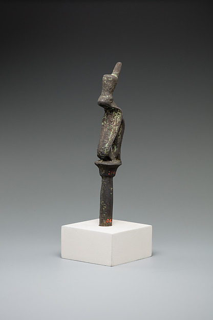 Cobra wearing red crown on a papyrus stem