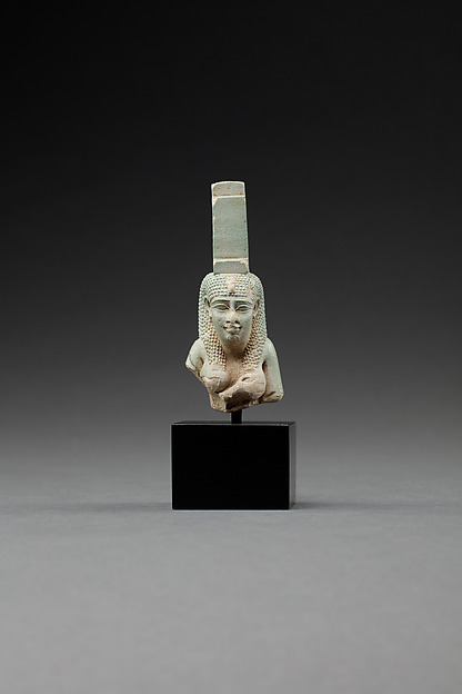 Upper part of a figure of Isis nursing Horus